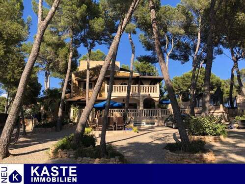 Titel - Charmantes Haus mit Garten und Terrasse im schönen Cala Vinyes auf Mallorca.