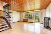 Wohn- und Essbereich mit Kamin - 