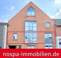 Urban wohnen mit kurzen Wegen: 2-Zimmer-Eigentumswohnung im 1. Obergeschoss mit PKW-Stellplatz - Husum