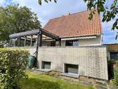 Rückansicht - 4 Zimmer Einfamilienhaus zum Kaufen in Lage