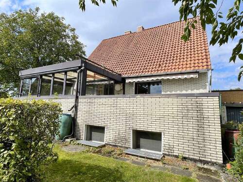Rückansicht - 4 Zimmer Einfamilienhaus zum Kaufen in Lage