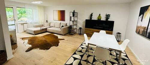 Offener Wohn-/Ess-/Kochbereich - Etagenwohnung mit 91,40 m&sup2; in München zum Kaufen