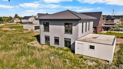 Außenaufnahme - Mehrfamilienhaus, Wohnhaus mit 186,30 m² in Jever zum Kaufen