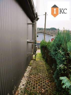 Seitenansicht - Mehrfamilienhaus, Wohnhaus mit 45,00 m&sup2; in Weiskirchen zum Kaufen