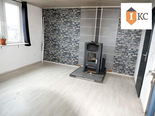 Wohnzimmer mit Kaminofen - 