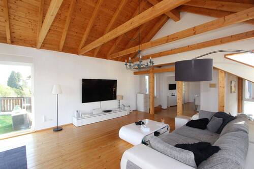 Wohnraum Ansicht 1 - Licht, Luft & Charme: 135?m² Traumwohnung mit Sichtbalken und großer Terrasse