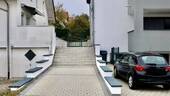 Stellplatz und Tor zum hinteren Garten - 
