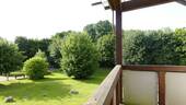 Balkon mit Glasdach und Beschattung - 
