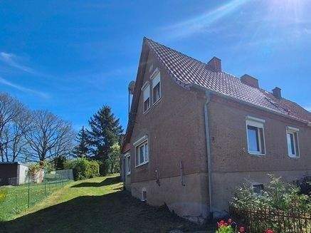 Straßenansicht - Mehrfamilienhaus, Wohnhaus zum Kaufen in Feldberger Seenlandschaft