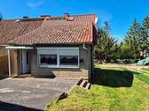 Gartenansicht mit Terrasse - Mehrfamilienhaus, Wohnhaus in Feldberger Seenlandschaft