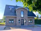 Ansicht - K 585: Junges Einfamilienhaus mit großzügiger Raumaufteilung und Doppelgarage in ruhiger Lage von Lünne!