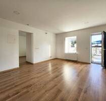 Moderne 2-Zimmer Erdgeschosswohnung mit Terrasse in Damflos zu vermieten