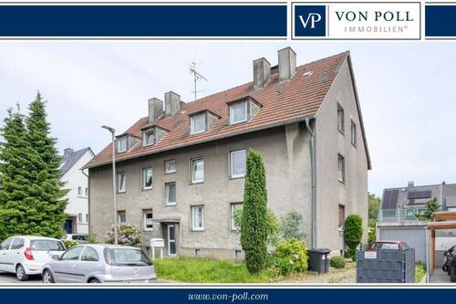 Vorderseite - Solides Mehrfamilienhaus mit zwei Garagen