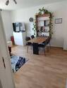Blick in das Wohnzimmer - 2 Zimmer Etagenwohnung zur Miete in Oerlinghausen Helpup