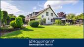 Hausansicht - Idyllische und familienfreundliche Wohnlage direkt am Norderstedter Stadtpark!