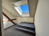 Dachzimmer mit Dachfenster - 