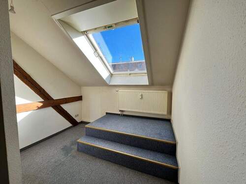 Dachzimmer mit Dachfenster - 