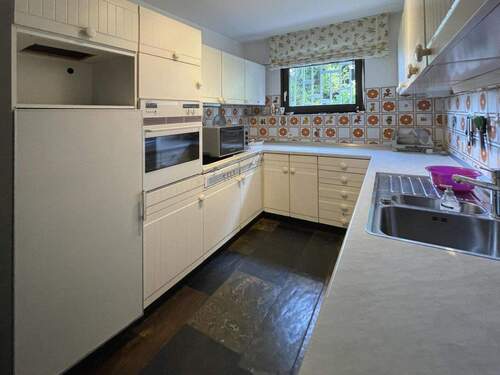 Küche mit Einbauküche - 