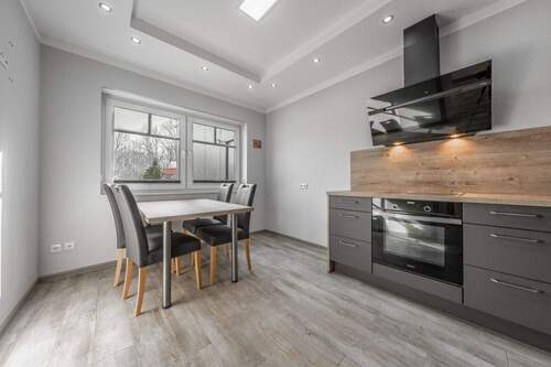 Die Einladende Küche mit Sitzmöglichkeit - 3 Zimmer Einfamilienhaus zum Kaufen in Löningen