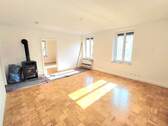 Wohnzimmer mit Kaminofen (Ablöse) - 4 Zimmer Etagenwohnung zur Miete in Kempten