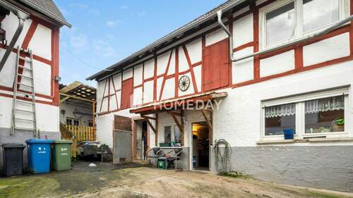 Außenansicht 4 - Einfamilienhaus mit 154,00 m&sup2; in Hungen zum Kaufen