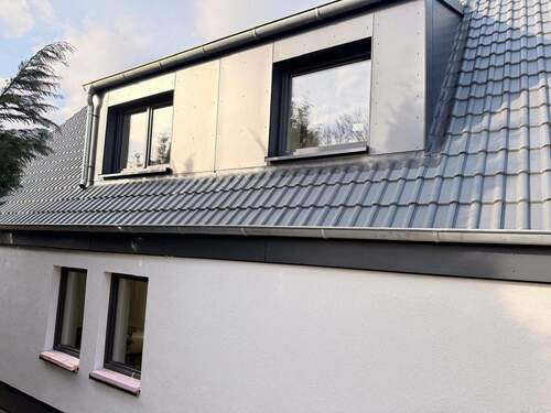 Seitenansicht Gauben - Einfamilienhaus mit 133,00 m&sup2; in Glinde zum Kaufen