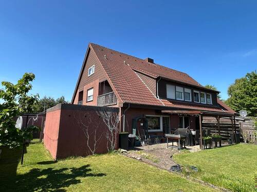 Bild 3 - 7 Zimmer Mehrfamilienhaus, Wohnhaus in Neuenkirchen