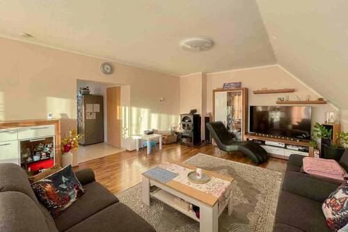 Wohnzimmer_Wohnung_OG - Einfamilienhaus mit 260,00 m&sup2; in Sereetz zum Kaufen