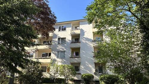 Südansicht - Stilvolle 1,5-Zimmer-Eigentumswohnung in zentraler Bestlage mit sonnigem Südbalkon