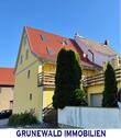 Ansichten - Gemütliches Einfamilienhaus mit großzügiger Terrasse und Ausbaupotential im Dachgeschoss.