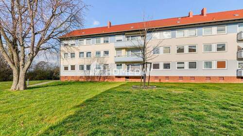 Außenansicht 3 - Charmante 1-Zimmer-Wohnung im Erdgeschoss mit Keller und Stellplatz - Erbpacht vorhanden
