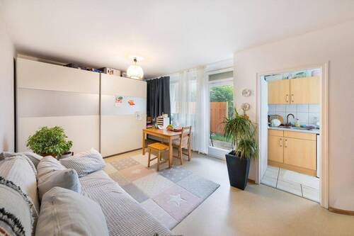 Wohnzimmer_Beispiel - Etagenwohnung mit 112,50 m&sup2; in Neufahrn zum Kaufen