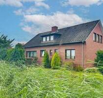 Gestaltbares Zuhause in Jork: EFH mit Südwest-Garten, Garagen und Sanierungsbedarf