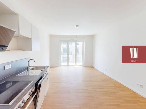 Ansicht I: Wohn- und Esszimmer mit offenem Küchenbereich - YON BERLIN - Moderne 2-Zimmer-Neubauwohnung mit EBK und sonnigem BALKON in Berlin-Friedenau