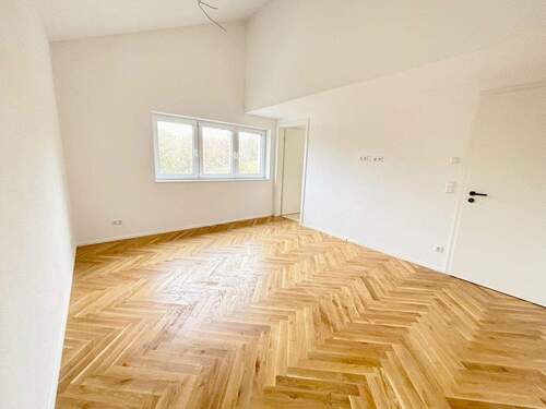 Schlafzimmer 1 mit Zugang zum Bad en Suite - 