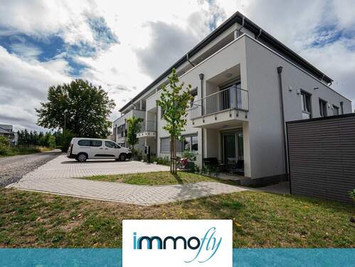 Hausansicht - Wohnen mit Stil und Komfort: Helle 2-Zimmer-Wohnung im 1. OG mit Balkon und barrierefreiem Zugang