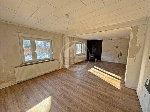 Wohn- und Esszimmer - 4 Zimmer Einfamilienhaus zum Kaufen in Aurich / Walle