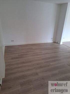  Wohnen - Exklusive 4-Zimmer-Erdgeschoss Wohnung mit Terrasse, Stellplatz und EBK am Theaterplatz Erlangen