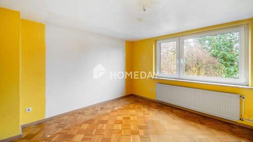 1. OG Schlafzimmer 1 - 