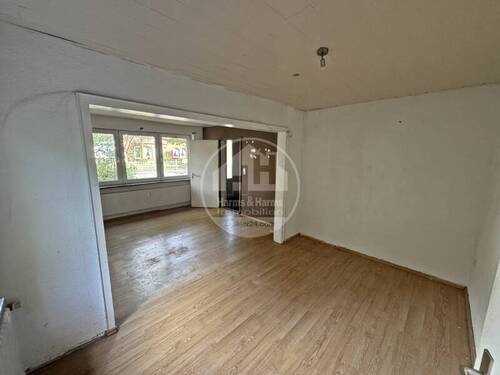 Wohnzimmer - 5 Zimmer Doppelhaushälfte zum Kaufen in Aurich