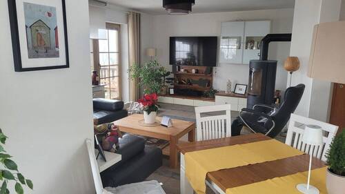 Wohnzimmer mit Kaminofen - 