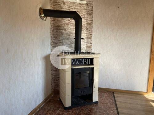 335.EG.Wohnzimmer.Kaminofen - 