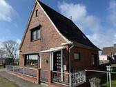 Frontansicht mit Eingang - 3 Zimmer Einfamilienhaus zum Kaufen in Nordstrand