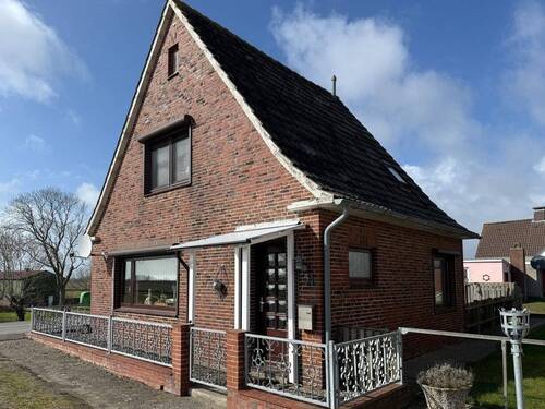 Frontansicht mit Eingang - 3 Zimmer Einfamilienhaus zum Kaufen in Nordstrand