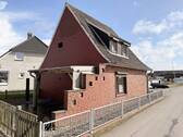 Seitenansicht mit Terrasse - Einfamilienhaus mit 80,00 m&sup2; in Nordstrand zum Kaufen