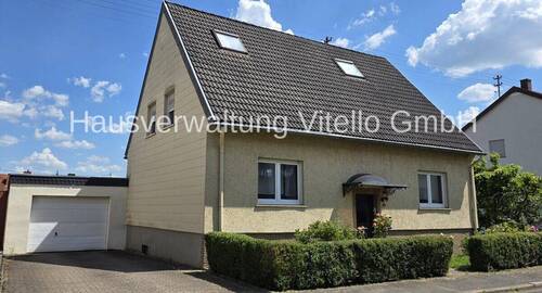 Bild 1 - Charmantes Einfamilienhaus mit Garten und Garage in attraktiver Lage!