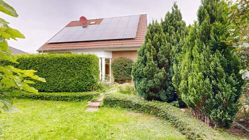 Rückseite mit Garten.jpg - Einfamilienhaus mit 114,00 m² in Werneuchen zum Kaufen