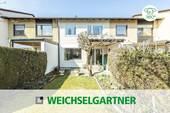 Im Alleinauftrag - Gepflegtes Reihenmittelhaus mit nahezu uneinsehbarem Garten und Tiefgaragen-Einzelstellplatz
