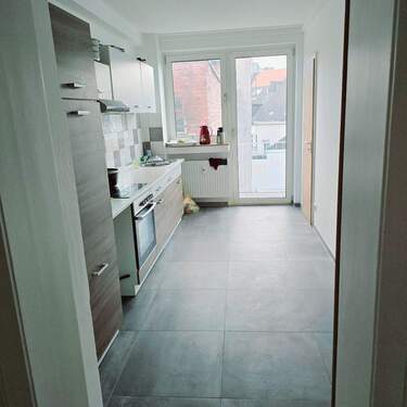 Küche mit Zugang zum Balkon - Etagenwohnung mit 75,00 m&sup2; in Aachen zur Miete