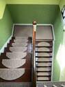 Treppenhaus mit Teppichstufen - 